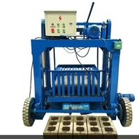 Machine portable de fabrication de briques en ciment, type à vibration et compactage, pour la production de blocs de béton emboîtables et creux