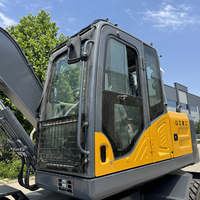 Excavatrice sur pneus fiable avec moteur Yuchai pour les travaux de terrassement et le développement des infrastructures, dotée d'une puissance de creusement élevée