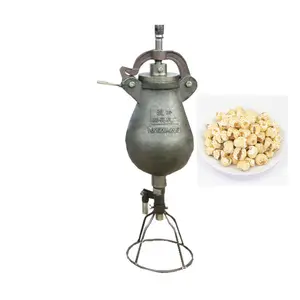 Kleine Unternehmen verwenden billige altmodische Popcorn-Maschine