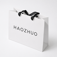 Sac en papier blanc de haute qualité avec logo imprimé, réutilisable, avec poignée en ruban, pour emballage cosmétique et soins de la peau