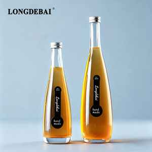 Botella de vidrio transparente vacía al por mayor de 330ml 500ml para agua mineral, agua mineral con gas y bebidas, con tapa de rosca - Product Image 1