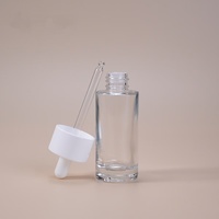Flacon compte-gouttes en verre cylindrique épais pour sérum 1oz 30ml Design plat à double paroi pour liquide d'emballage cosmétique pour soins de la peau Vente en gros