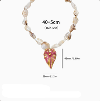 Collar de Conchas Naturales Irregulares Estilo Cerámico al por Mayor de Fábrica, con Cuentas de Concha Natural y Colgante de Acero Inoxidable para Mujer