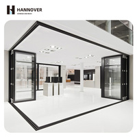 Puerta Plegable Moderna de Aluminio con Gran Apertura y Paneles de Vidrio Aislantes para Patio Exterior de Villa de Lujo, Aislamiento Térmico