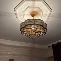 Lustre en laiton perforé à la main conçu de manière complexe pour la décoration de la maison et de la barre lumineuse