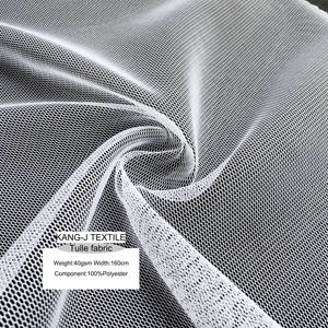 Nouveau populaire 100% polyester tulle <span class=keywords><strong>tissu</strong></span> 40gsm 160cm <span class=keywords><strong>pas</strong></span> <span class=keywords><strong>cher</strong></span> en gros <span class=keywords><strong>pour</strong></span> les vêtements et cheveux arc pince tulle <span class=keywords><strong>tissu</strong></span> - Product Image 1