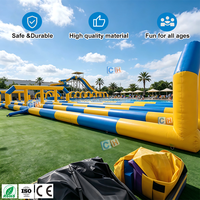 Toboggan aquatique gonflable commercial à double voie, long toboggan aquatique gonflable pour la location en extérieur, dans les jardins et parcs aquatiques