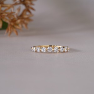 Luxury diamond eternity <b>ring</b> worn on woman hand showcasing elegant jewelry style ideal <b>wedding</b> engagement and everyday fashion - Product Image 1