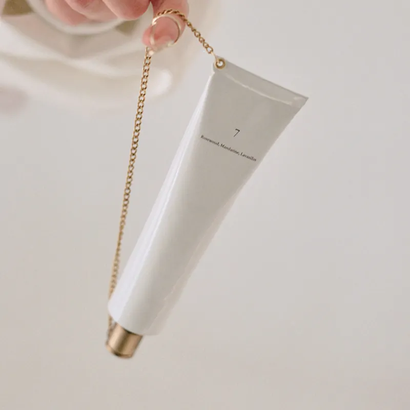 Aluminum Quality Custom 50ml 30ml Eco-friendly PCR Recycled Plastic Squeeze Hand Cream Tube with Key Chain Cosmetic Packaging