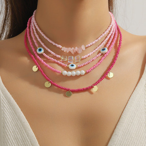 Vente en gros de bijoux tendance Collier multi-couches pour femmes avec chaîne de clavicule en pierre naturelle perlée Collier ras du cou en perles de <span class=keywords><strong>millet</strong></span> de Bohème - Product Image 2