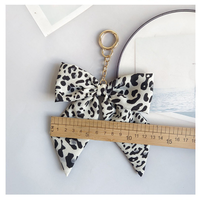 Porte-clés Nœud Imprimé Léopard Automne Hiver, Breloque de Sac en Tissu, Pendentif Créatif pour Clé de Voiture et Sac à Main, Accessoires Vintage pour Femme