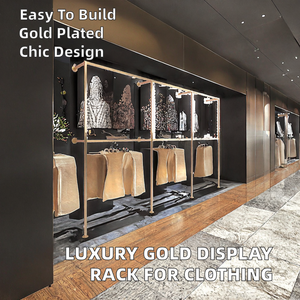 Hiện đại sang trọng tùy chỉnh vàng thép không gỉ cửa hàng tường hiển thị giá thời trang phụ nữ cửa hàng bán lẻ đồ đạc cho quần áo - Product Image 3