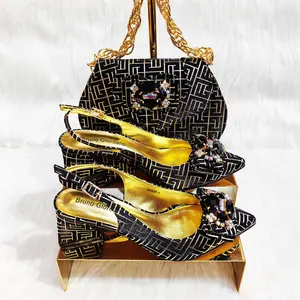 OEM kendinden fabrika doğrudan satış moda tasarım Rhinestone lüks büyük zincir siyah orta topuk kadın ayakkabı ile uyumlu çanta