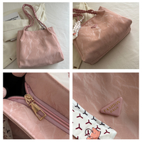 Sacs à main de luxe de marque de Guangzhou pour femmes de haute qualité, tendance 2024, avec chaînes, bandoulière unique, style tendance pour l'été et l'hiver
