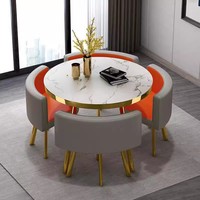 Ensemble de table à manger ronde moderne avec pieds en métal et plateau en résine, design stable pour salles à manger et salons