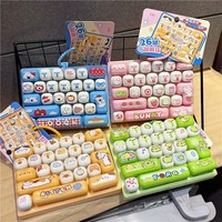 Nouveau porte-clés anti-stress créatif et mignon en ABS à 26 touches, avec clip pour sac à dos, motifs lapin, chat, grenouille