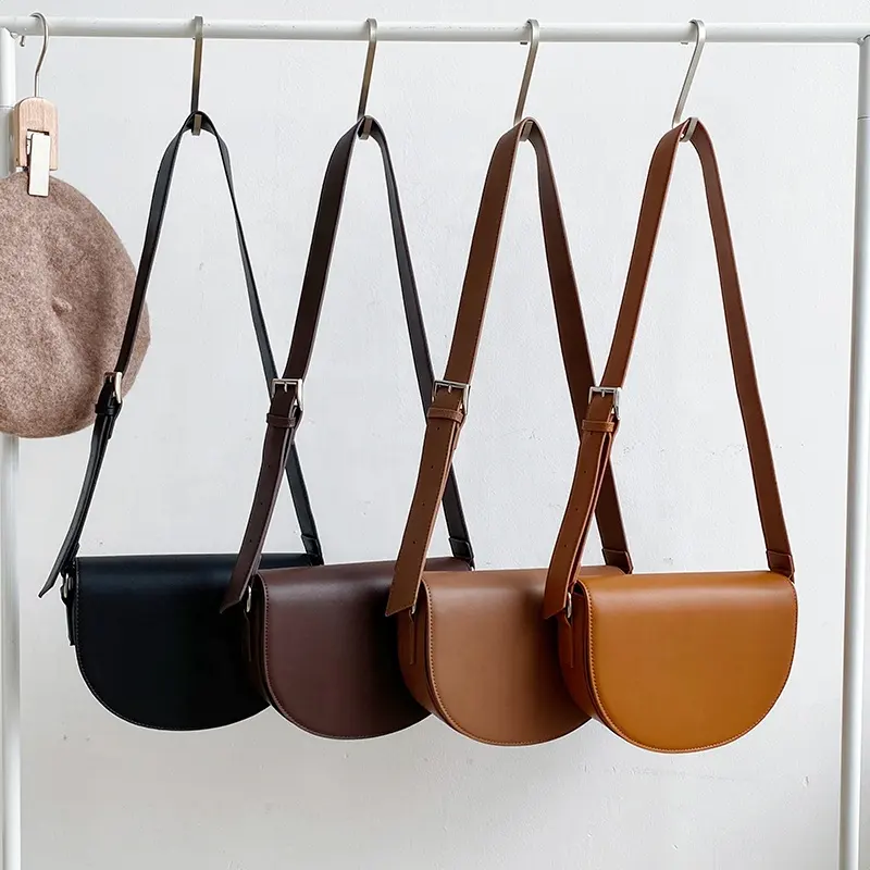 2023 Female Solid Color Saddle Design One-shoulder Crossbody Bag Fashion Trend Semicircle Pu Bag Clamshell Saddle Bag