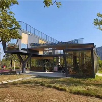 Edificio de Tiendas en Contenedores de Varios Pisos Personalizado, Cafetería Modular Prefabricada en Contenedores con Terraza en el Techo