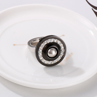 Bague circulaire pour femme, sertie de cristaux, plaquée noir et argent, deux options de couleur, disque rotatif en acier inoxydable