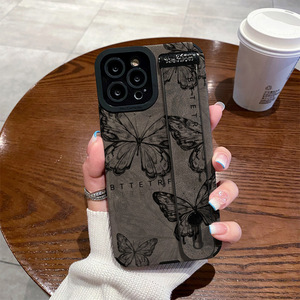 Soporte de pulsera de Mariposa Negra para <span class=keywords><strong>iPhone</strong></span> 16 Pro Max para Apple 15 14 y 13 <span class=keywords><strong>funda</strong></span> de teléfono móvil con cordón de Material de PU - Product Image 6