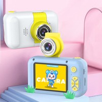 Appareil photo pour enfants mignon avec objectif rotatif à 180°, écran HD 2,4 pouces, enregistrement vidéo 1080p, zoom optique 10x, écran IPS avec protection des yeux, filtre CMOS, jeux et musique