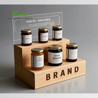 Présentoir d'étape en bois à 3 niveaux de haute qualité avec panneau arrière en acrylique pour pot de confiture gravé avec logo de marque