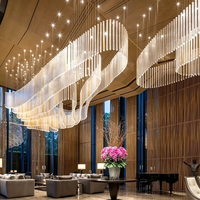 Lustre en cristal de grande taille OEM ODM, luminaire suspendu LED anti-éblouissement, éclairage moderne minimaliste sur mesure pour salle de bal d'hôtel