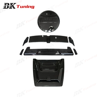 Kit de tuning BK pour Mercedes-Benz Classe G G63 W464 W465, version 2025, comprenant capot en carbone sec Bra-Bus 800, lanterne de toit, becquet arrière et cache-roue.