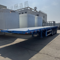 Semi-remorque plateau à charge lourde 40 pieds 3 essieux 80 tonnes avec suspension mécanique à plaques diamantées, pneus radiaux et pieds de stationnement