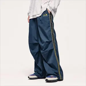 Enflasyon kalça Pop yığılmış naylon eşofman altları Streetwear erkek pantolon pantolon özel Logo baskı paraşüt pantolon