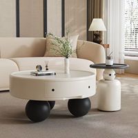 Table basse de style crème pour un salon minimaliste, petit appartement, table basse ronde moderne, simple et haut de gamme