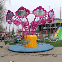 Manège de Noël pour enfants à monnayeur, taille réelle, avec chaises volantes à thème de dessin animé