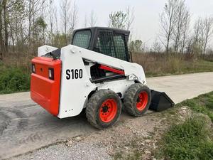 Chargeuse compacte sur pneus S160, roues blanches et rouges, machine de construction d'occasion - Product Image 2