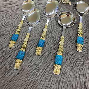 ชุดช้อนเสิร์ฟที่ออกแบบอย่างสวยงามพร้อมการออกแบบบนด้ามจับเป็นพิเศษสำหรับห้องครัวของคุณ - Product Image 1