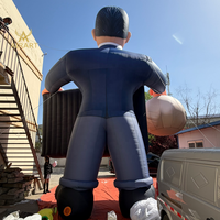Homme d'affaires gonflable personnalisé avec sac à monnaie, ballon géant gonflable représentant un capitaliste pour activité publicitaire