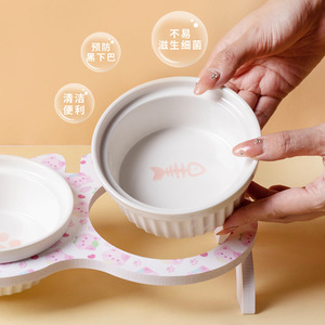 Comedero doble elevado de cerámica para gatos con diseño de huellas de patas, juego de platos para comida y agua. - Product Image 3
