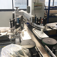 Machine d'étiquetage adhésive double face à grande vitesse pour bouteilles en plastique