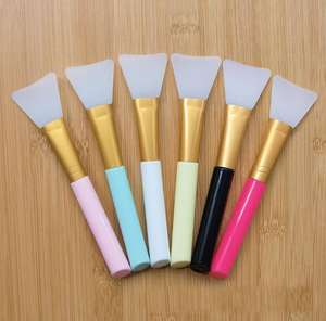 Pinceau de beauté en silicone blanc à queue ronde pour masque facial - Product Image 1