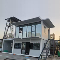 Maison conteneur modulaire démontable à deux étages en acier, pour logement, bureau, usage en camp de chantier et villa