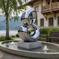 Sculpture moderne abstraite personnalisée en acier inoxydable, finition miroir, chiffre 8, statue métallique pour bassin de plaza commercial