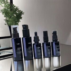 ขวดแก้วสีดำม่วงเข้มสำหรับเครื่องสำอาง ขนาด 50 มล. 100 มล. แบบไหล่เรียบ พิมพ์ฉลากสกรีนผ้าไหมตามสั่ง - Product Image 1