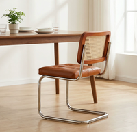 Chaises de salle à manger modernes à structure métallique avec revêtement en cuir, écologiques, durables, design de dossier incurvé, garantie 1 an, 2026