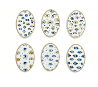 Vente en gros de dessous-de-plat en céramique œil porte-bonheur, ovale bleu méditerranéen doré, résistant à la chaleur, décoration de table