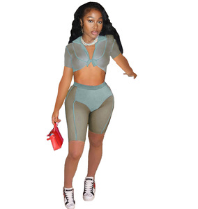 <span class=keywords><strong>2022</strong></span> Sexy <span class=keywords><strong>primavera</strong></span> <span class=keywords><strong>estate</strong></span> 2 pezzi abito da donna maglia Patchwork manica corta scollo a v camicia elastico in vita Set di pantaloncini a due pezzi - Product Image 2