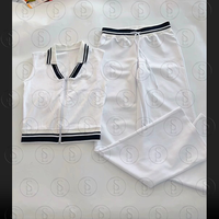 Ensemble 2 pièces pour femme : Veste polo sans manches et jupe en coton doux, style Y2K, avec logo personnalisé, idéal pour le golf et les tenues de villégiature.