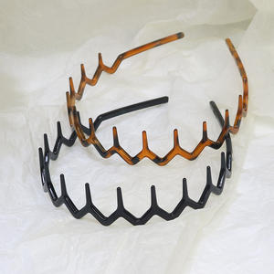 Vente en gros de peignes à cheveux bandeaux en plastique noir unisexe bandeaux à dents antidérapants pour femmes hommes filles - Product Image 4