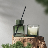 Diffuseur d'huiles essentielles en verre de luxe AIKUN avec bâtonnets en fibre noire et bougie pour parfumer la maison