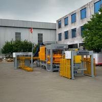 Machine automatique de fabrication de pavés et de blocs en béton QT8-15 avec moules personnalisés