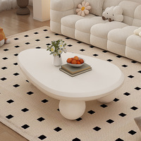 Table basse nuage crème style moderne et épuré pour salon