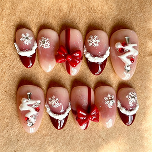 Faux ongles à presser en amande, motif flocon de neige 3D et nœud de Noël entièrement orné de strass, style français festif et charmant, vente en gros - Product Image 1